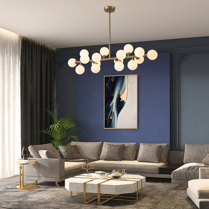 Lustre linéaire moderne du milieu du siècle de 101,6 cm (40 po), suspension Sputnik en laiton doré à 16 lumières avec globe en verre dépoli pour salle à manger