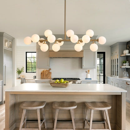 Lustre linéaire moderne du milieu du siècle de 101,6 cm (40 po), suspension Sputnik en laiton doré à 16 lumières avec globe en verre dépoli pour salle à manger