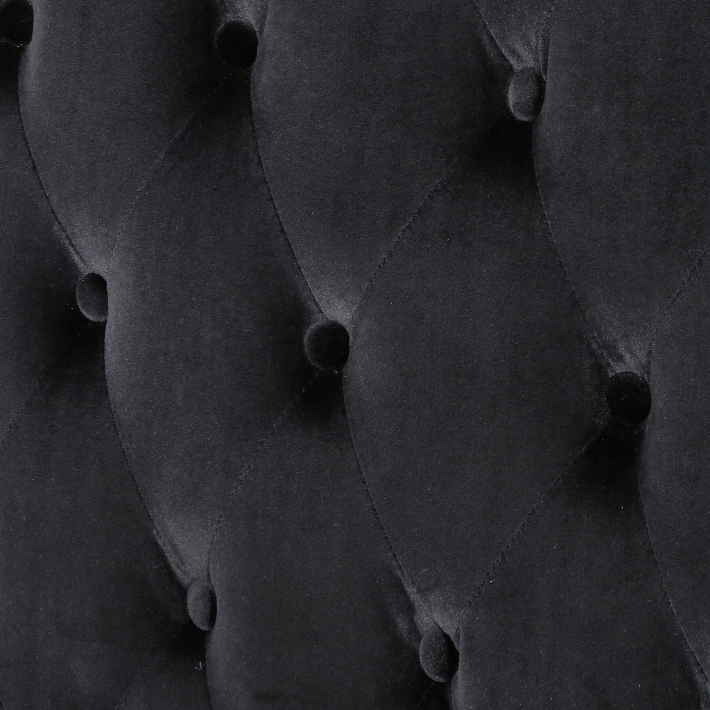 Canapé deux places à oreilles haut capitonné en velours noir