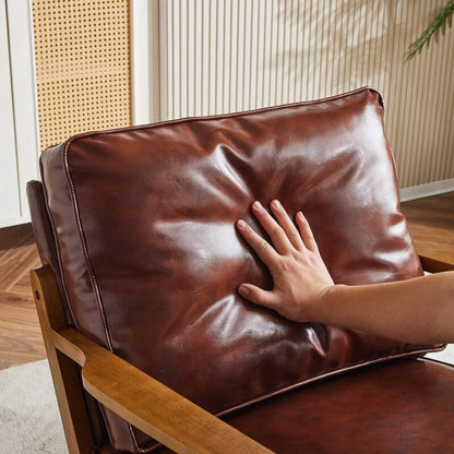 Fauteuil d'appoint beige en lin mélangé, pieds en bois et un coussin.